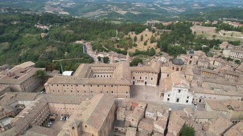 Aerial view of an Italian UNESCO historic city with well-preserved medieval architecture, prominent