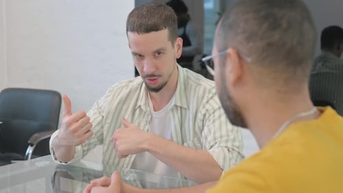 Close up of Creative People Talking at Work