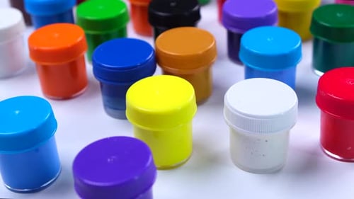 Rotating Light Blue Pastel Background with Water Drops or Transparent Cosmetic Gel Fluid Hyaluronic