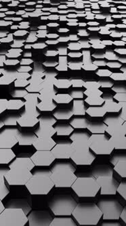 Animación de mosaicos hexagonales negros en 3D que se mueven en un patrón suave.