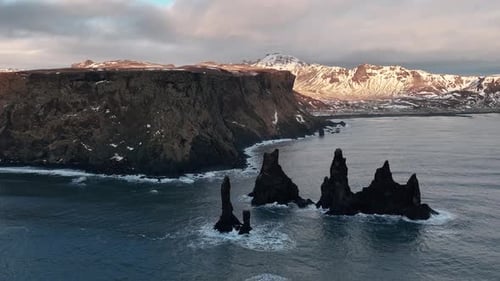 Reynisdrangar Basalt Sea Stacks In South Iceland - Aerial Drone Shot