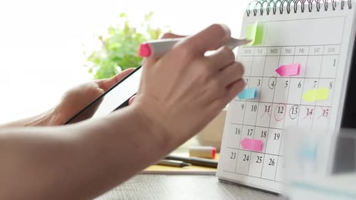 Scheduling on Smartphone, Marking Calendar on Desk