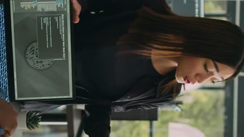 Vertical Video Asian Database Programer Explaining Software Development