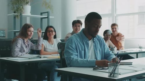 Students Collaborating and Studying in a Modern University Classroom