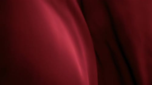 Wavy red chiffon fabric flowing in the wind. Abstract texture background