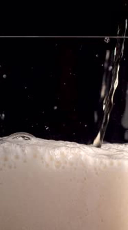 Craft Beer Being Poured Into a Glass