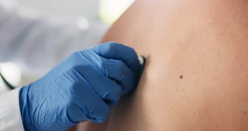 Man, physician hands and stethoscope on back in clinic, asthma test and listening to patient