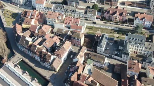 Beautiful streets of an european city with traffic on the roads, aerial footage in 4k