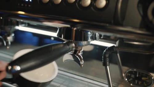 Coffee machine on a wooden table Slow motion.