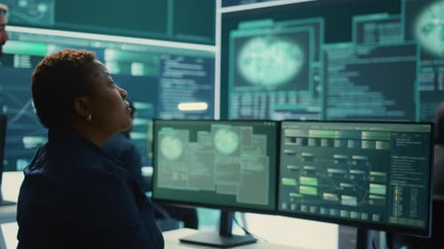 Tech Workers Coding in Modern Office