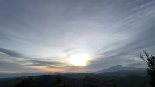 beautiful sky and clouds in the mountains at sunset
