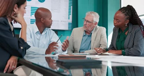 Business, man and meeting with team in office for audit, finance report and review budget