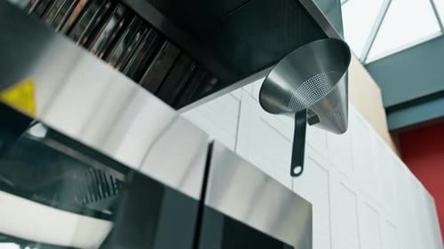 Professional commercial empty clean modern kitchen in restaurant or cafe Metal kitchen equipment