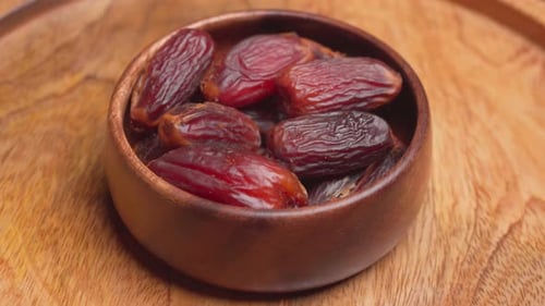 Delicious Bowl of Dates Rotating Close Up