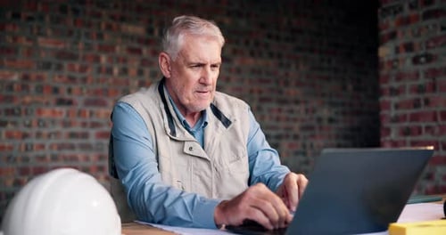 Laptop, happy and architect on site with typing for email on building, maintenance