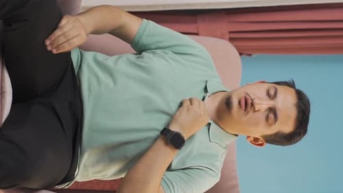 Vertical video of The man having a nervous breakdown is angry and does not feel well.