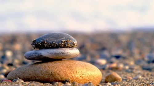 Rock Balancing on Ocean Beach