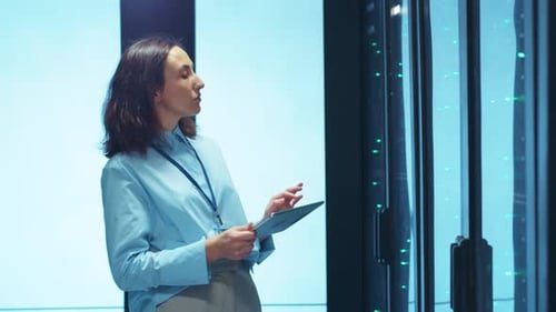 A Professional Woman Working in a Modern and Innovative Office Space Environment