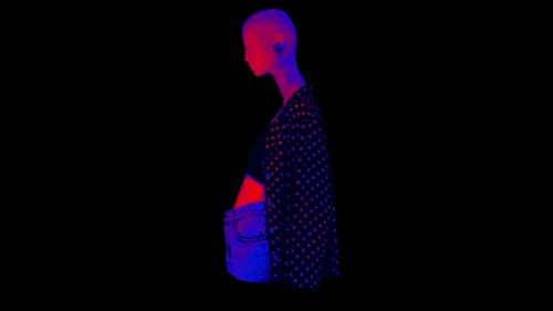 Neon Polka Dot Mannequin Rotating Fashion Model