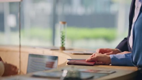 Closeup Hands Give Documents on Reception Visitors Couple Check in Arrive Hotel