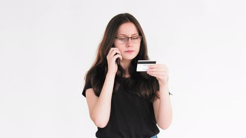 Bank Fraud Phone Scam Confused Woman Credit Card