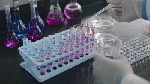 Lab Close Up with Pipette and Test Tubes