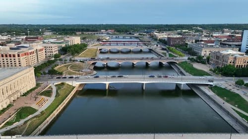 Aerial view of Des Moines, Iowa, highlighting the Des Moines River, prominent bridges, and the histo