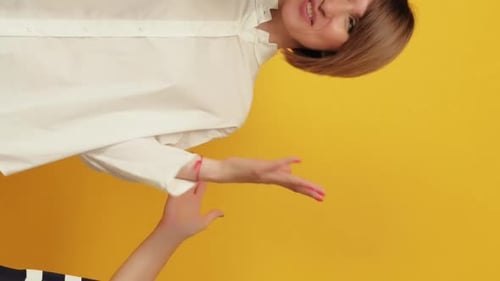 Three Smiling Women Laughing Together Indoors