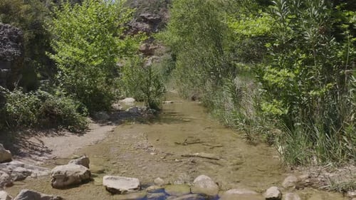 Slow shot over a small river in Greece