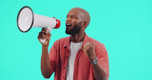 Megaphone, protest and man fist for human rights, racism and equality, freedom of speech