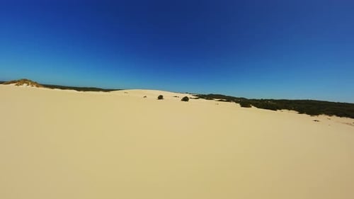 Sand Dunes in the Desert During the Day Drone Video