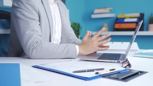 Close-up thoughtful businessman hands typing on keyboard on laptop.