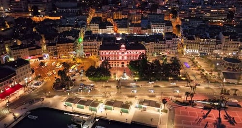 Aerial Video in Cannes with a View of the Beach and Luxurious Buildings at Night Prestigious