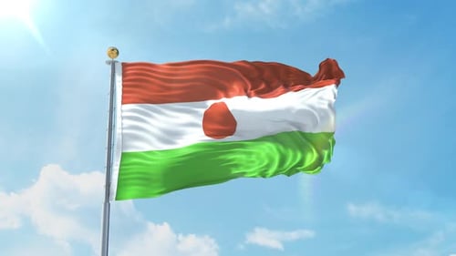 Realistic Niger National Flag Waving in Blue Sky