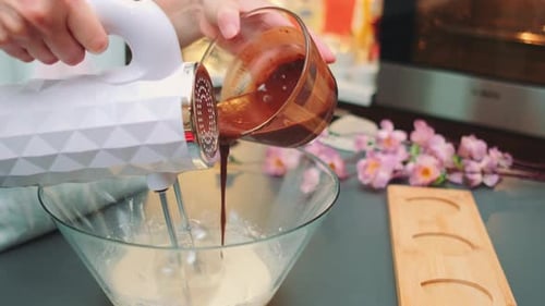 Mixing Dough for Muffins Pour the Chocolate Batter in a Thin Stream
