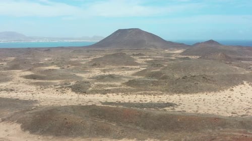 Aerial Drone View of Desert Volcanic Landscape with Montana de La Caldera on Isla de Lobos, Canary I