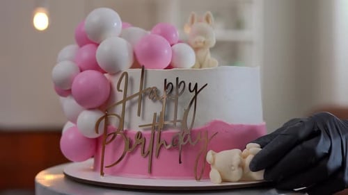 Decorating a Sweet Birthday Cake with Teddy Bear