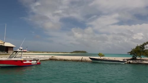 Boats and endless horizon with beautiful clouds in the sky.