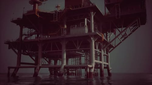 An Offshore Oil Rig in the Vast Expanse of the Ocean