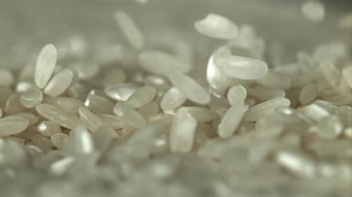 Rice Falls on the Table Filmed on a Highspeed Camera at 1000 Fps