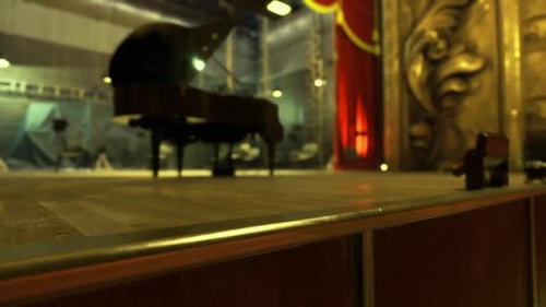 Theater Setting with Piano Scene Depicts Rehearsal with Solo Musician