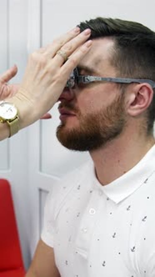 Adult Man During Eye Exam in Clinic