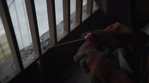 Worker Welding Metal Sparks Close Up