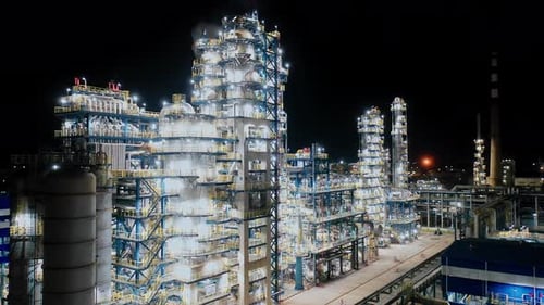 Aerial view of chimneys of power plant, an industrial district. Modern large thermal power plant