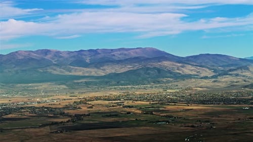 Summer mountains panorama time lapse over a beautiful national park valley