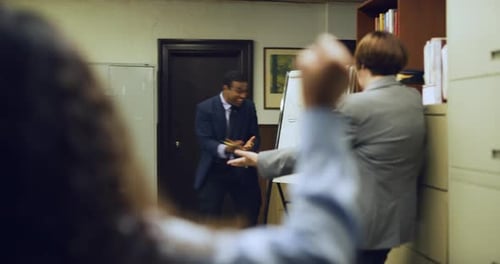 Enthusiastic Business Presentation in Office Setting