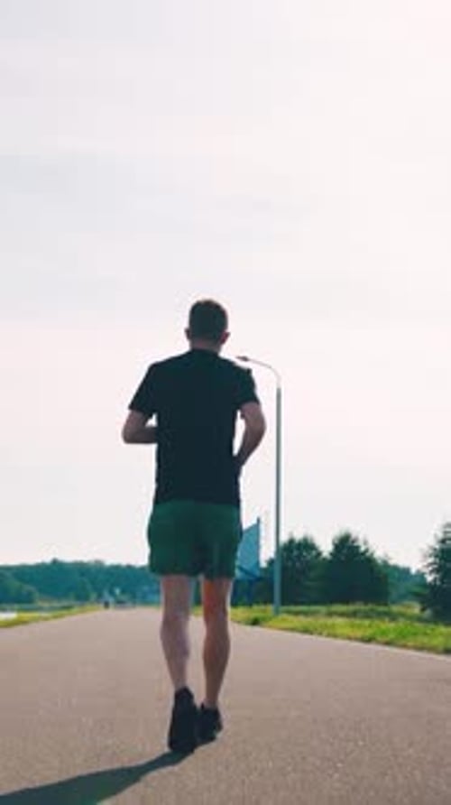 Runner Run Active Confident Hardy Man Running Back View Daylight Sunny Hot Morning Endurance Cardio