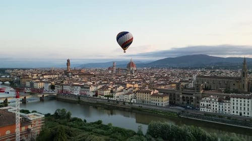 Colorful Hot Air Balloon Epic Flying Above Florence at Sunrise Italy