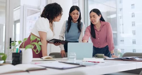 Business women, laptop and research with collaboration, teamwork and website design in office