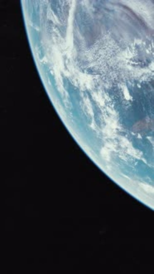 Beautiful Rotating Earth Planet in Outer Space Vertical